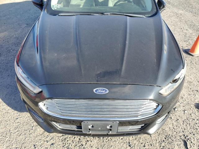 Photo 11 from auction – 2013 FORD FUSION S with VIN 3FA6P0G79DR311642