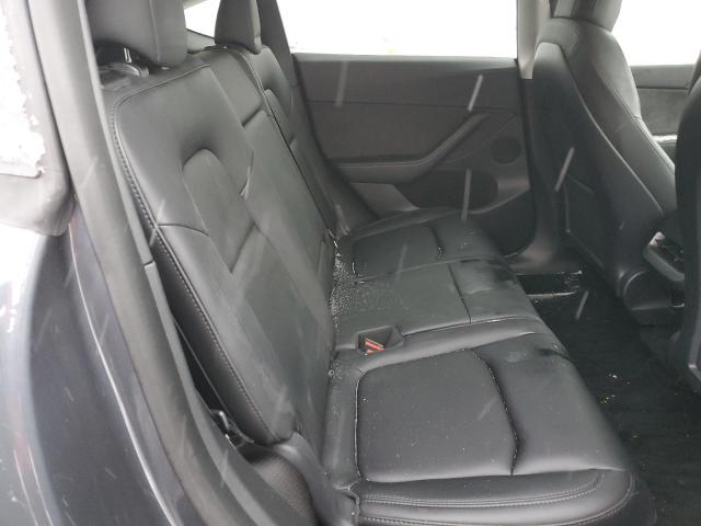 Photo 11 from auction – 2023 TESLA MODEL Y with VIN 7SAYGAEE4PF597693
