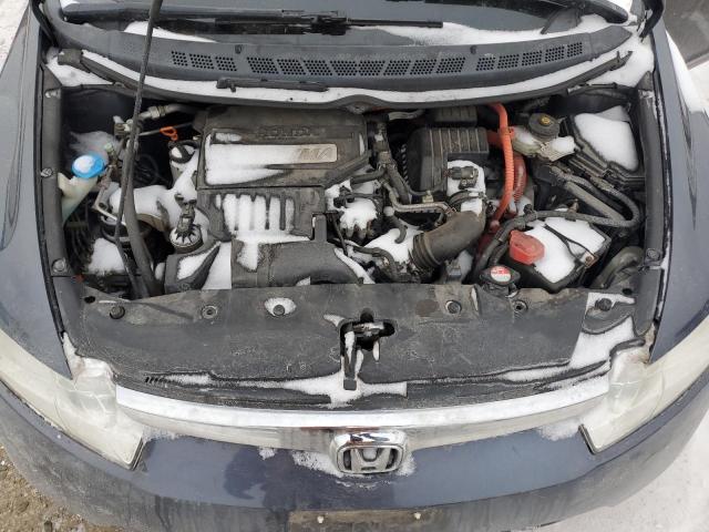 Photo 11 from auction – 2007 HONDA CIVIC HYBR with VIN JHMFA36237S007250