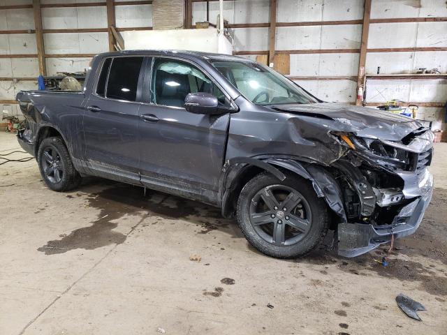 Photo 4 from auction – 2023 HONDA RIDGELINE with VIN 5FPYK3F57PB064699