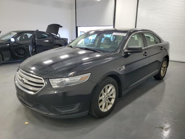FORD TAURUS SE 2014 with VIN 1FAHP2D89EG150719 - Photo from auction