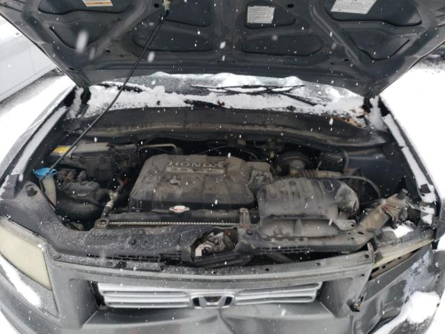 Photo 11 from auction – 2007 HONDA RIDGELINE with VIN 2HJYK16477H526818
