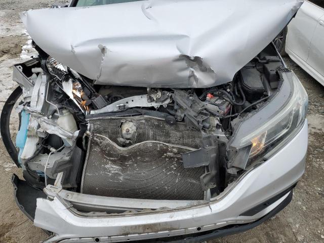 Photo 12 from auction – 2016 HONDA CR-V LX with VIN 2HKRM4H31GH670378