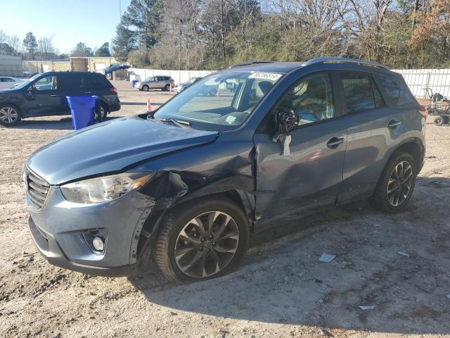MAZDA CX-5 GT 2016 with VIN JM3KE2DY9G0693173 - Photo from auction