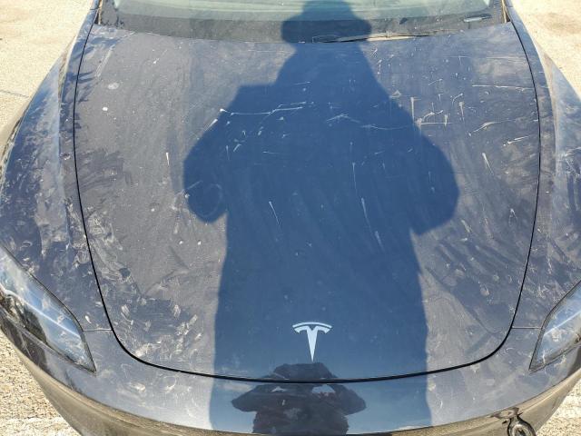 Снимка 11 от търг – 2024 TESLA MODEL 3 с VIN 5YJ3E1EAXRF858919