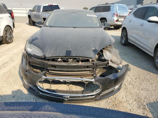 Снимка 5 от търг – 2014 TESLA MODEL S с VIN 5YJSA1H1XEFP48028