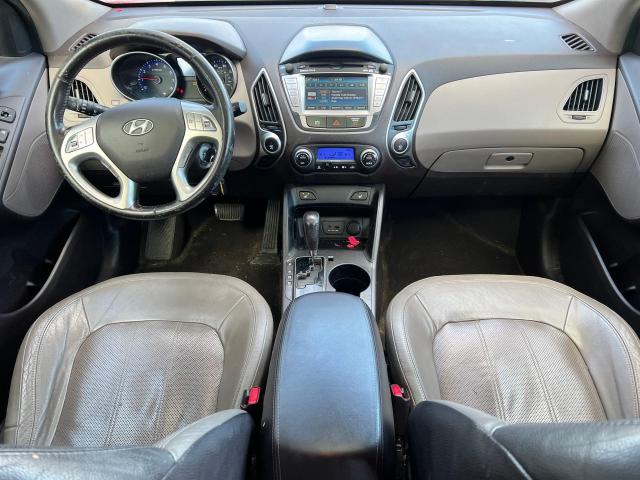 Photo 9 from auction – 2012 HYUNDAI TUCSON GLS with VIN KM8JUCAC0CU375513