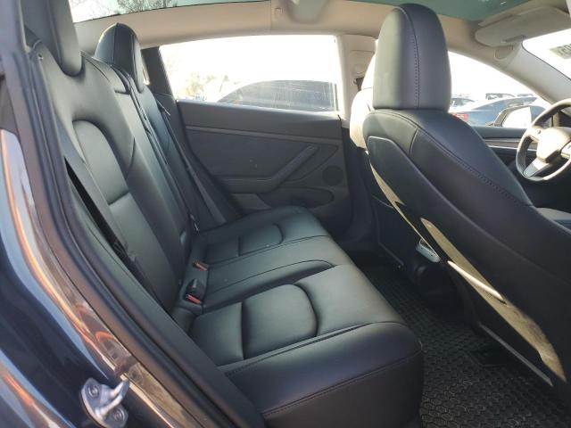 Photo 11 from auction – 2023 TESLA MODEL 3 with VIN 5YJ3E1EA3PF553047