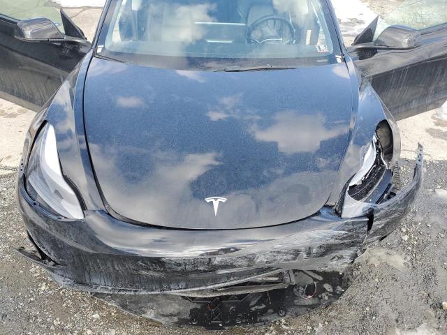 Photo 11 from auction – 2022 TESLA MODEL 3 with VIN 5YJ3E1EA0NF286575