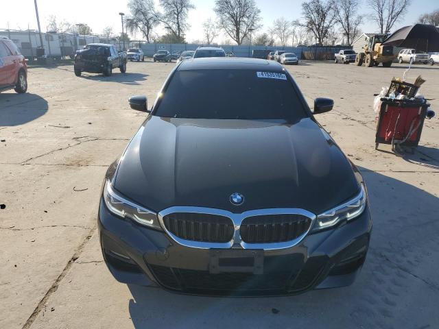 Photo 5 from auction – 2021 BMW 330I with VIN 3MW5R1J07M8B60952