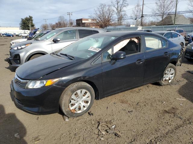 HONDA CIVIC LX 2012 with VIN 2HGFB2F56CH582237 - Photo from auction