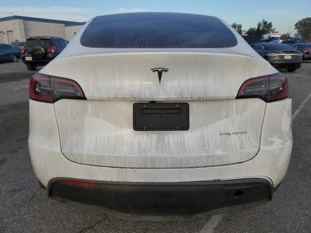Photo 6 from auction – 2023 TESLA MODEL Y with VIN 7SAYGDEE6PF823279