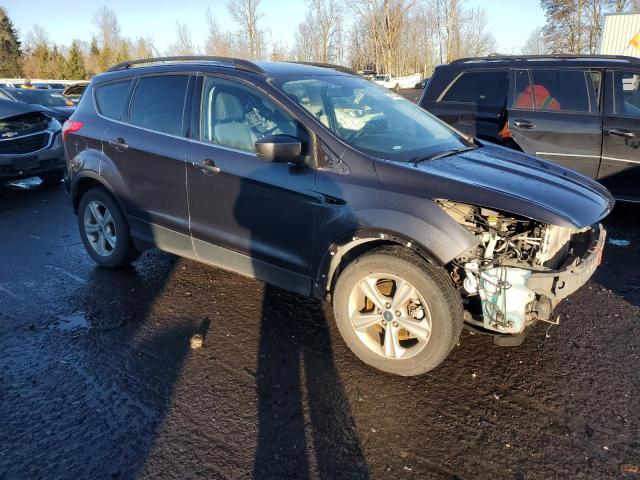 Photo 4 from auction – 2016 FORD ESCAPE SE with VIN 1FMCU9GXXGUA40187