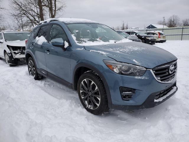 Photo 4 from auction – 2016 MAZDA CX-5 GT with VIN JM3KE4DYXG0741128