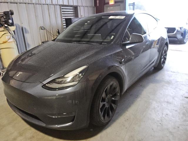 TESLA MODEL Y 2023 with VIN 7SAYGDEE6PA044784 - Photo from auction