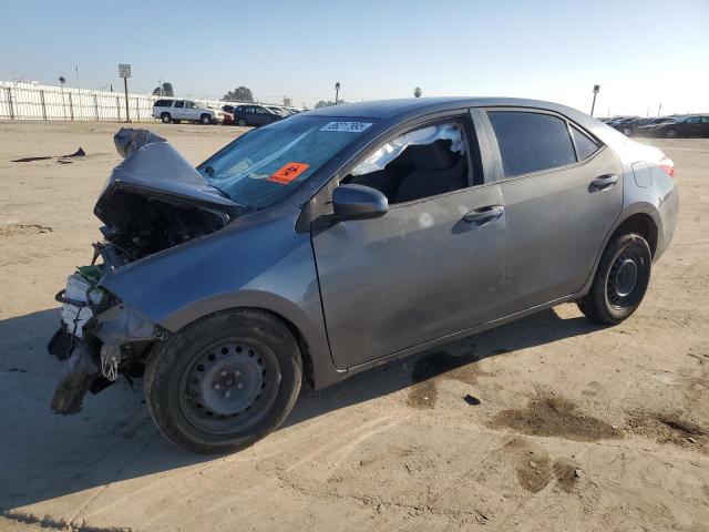 TOYOTA COROLLA L 2015 with VIN 5YFBURHE9FP291310 - Photo from auction