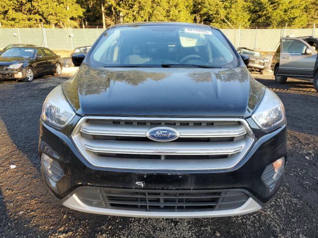 Photo 5 from auction – 2017 FORD ESCAPE SE with VIN 1FMCU9G98HUB04178