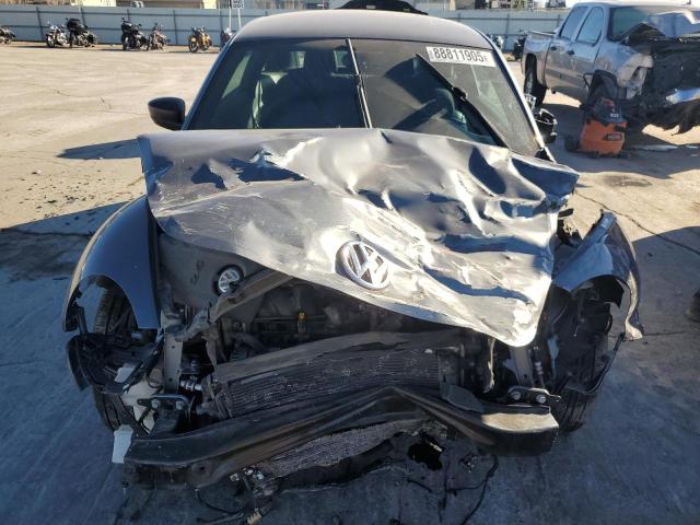 Photo 5 from auction – 2014 VOLKSWAGEN BEETLE with VIN 3VWFP7AT3EM631186