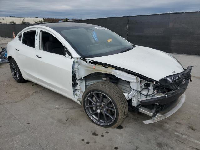Photo 4 from auction – 2022 TESLA MODEL 3 AW with VIN 5YJ3E1EB6NF119582