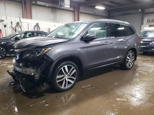 HONDA PILOT ELIT 2017 with VIN 5FNYF6H06HB099171 - Photo from auction