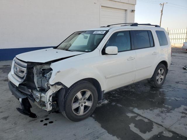 HONDA PILOT EXL 2011 with VIN 5FNYF4H56BB049863 - Photo from auction