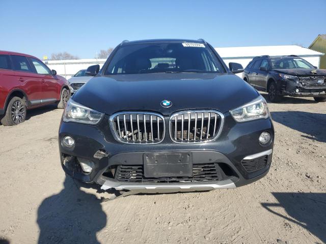 Photo 5 from auction – 2017 BMW X1 XDRIVE2 with VIN WBXHT3Z38H4A56710