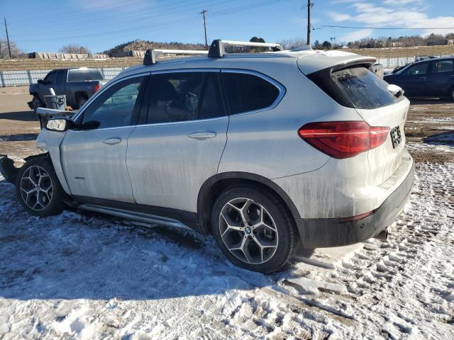 Photo 2 from auction – 2017 BMW X1 XDRIVE2 with VIN WBXHT3C35H5F73417