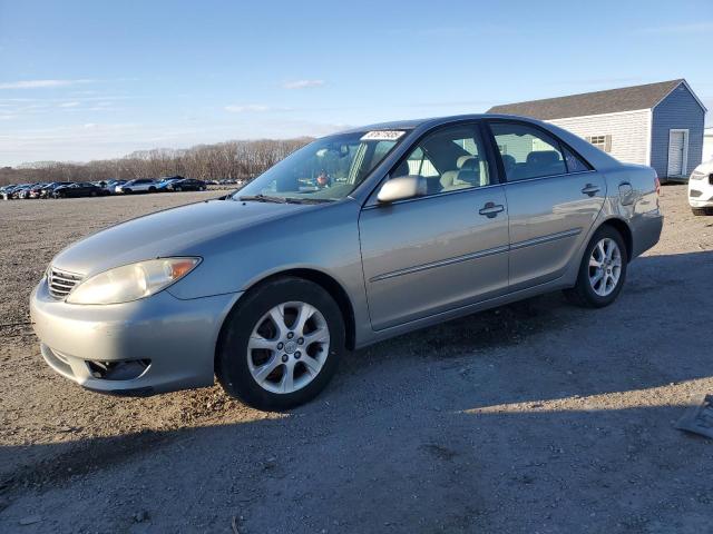 TOYOTA CAMRY LE 2005 with VIN 4T1BF30K95U617659 - Photo from auction