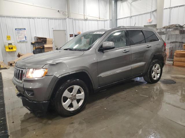 JEEP GRAND CHER 2011 with VIN 1J4RR4GT4BC587402 - Photo from auction