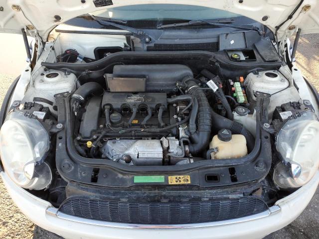 Photo 11 from auction – 2009 MINI COOPER S with VIN WMWMF73579TW80925