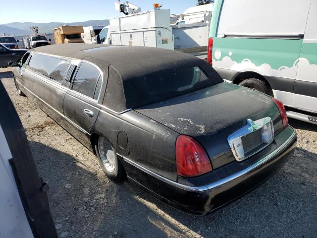 Photo 2 from auction – 2001 LINCOLN TOWN CAR E with VIN 1L1FM81W51Y704307