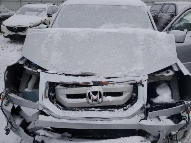 Снимка 12 от търг – 2010 HONDA PILOT EX с VIN 5FNYF4H49AB017415