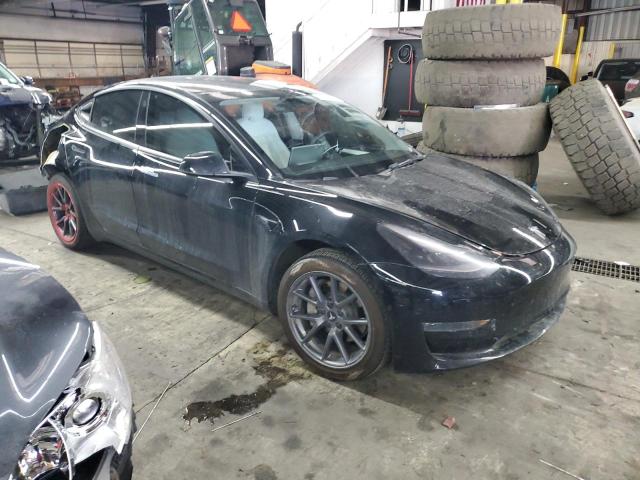 Photo 4 from auction – 2022 TESLA MODEL 3 with VIN 5YJ3E1EB8NF277115