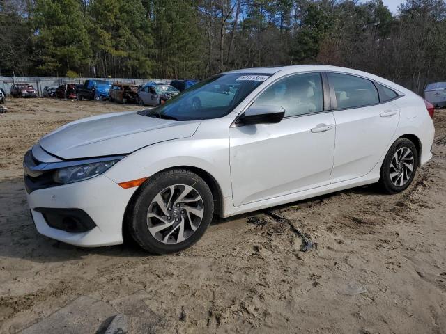 HONDA CIVIC EX 2018 with VIN 2HGFC2F8XJH517718 - Photo from auction