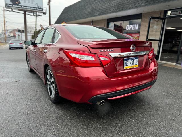 Photo 3 from auction – 2016 NISSAN ALTIMA 2.5 with VIN 1N4AL3AP0GC219158