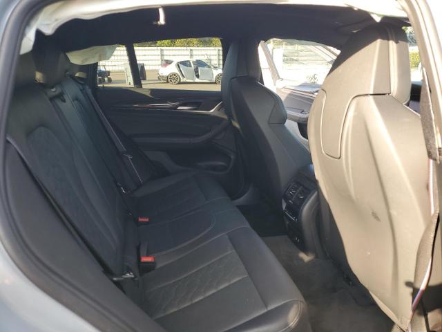 Photo 11 from auction – 2022 BMW X4 M with VIN 5YM23EC00N9L35827