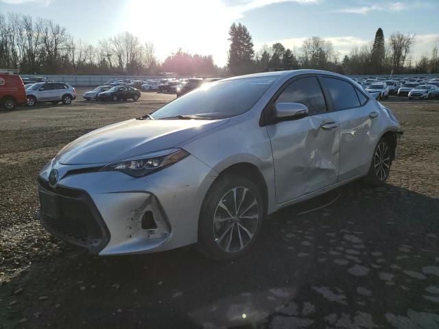 TOYOTA COROLLA L 2018 with VIN 2T1BURHE4JC031826 - Photo from auction