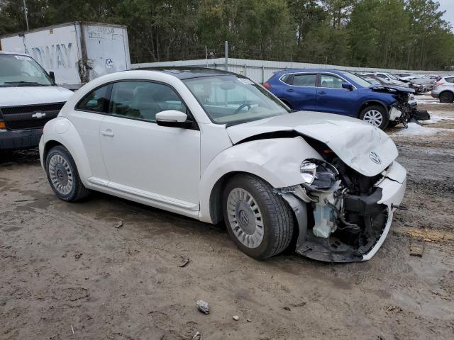 Photo 4 from auction – 2014 VOLKSWAGEN BEETLE with VIN 3VWJP7AT7EM613977