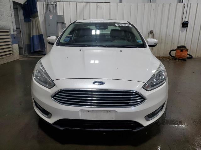 Photo 5 from auction – 2016 FORD FOCUS TITA with VIN 1FADP3J26GL324793