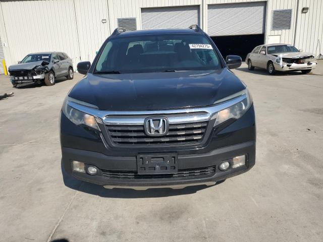 Photo 5 from auction – 2017 HONDA RIDGELINE with VIN 5FPYK2F57HB005101