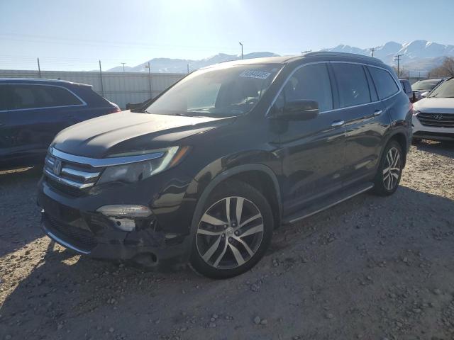 HONDA PILOT ELIT 2017 with VIN 5FNYF6H09HB030751 - Photo from auction