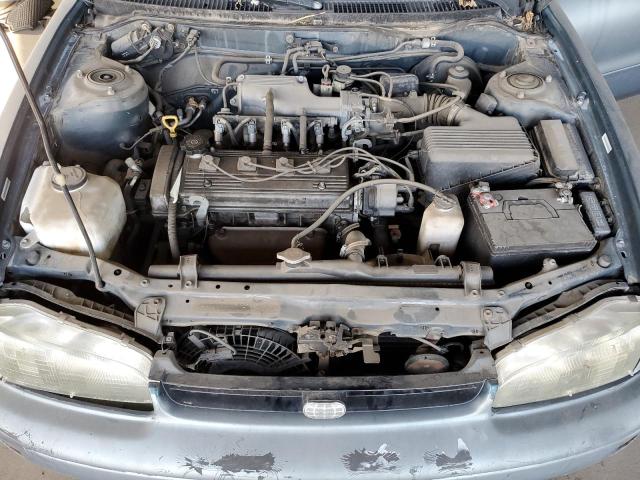 Photo 11 from auction – 1995 GEO PRIZM BASE with VIN 1Y1SK5269SZ085206