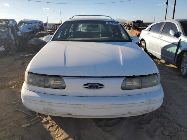 Photo 5 from auction – 1994 FORD TAURUS with VIN 1FALP57U8RG135607