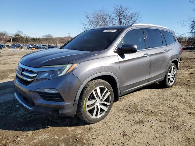 HONDA PILOT ELIT 2017 with VIN 5FNYF6H08HB081710 - Photo from auction
