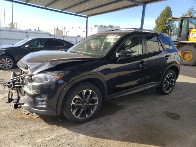 MAZDA CX-5 GT 2016 with VIN JM3KE4DY0G0853615 - Photo from auction