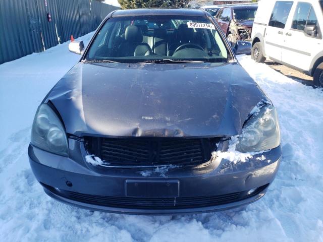 Photo 5 from auction – 2007 KIA OPTIMA LX with VIN KNAGE123275146956