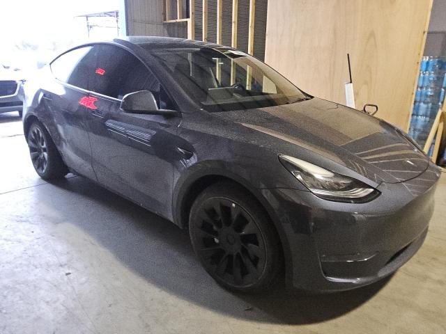 Photo 4 from auction – 2023 TESLA MODEL Y with VIN 7SAYGDEE6PA044784