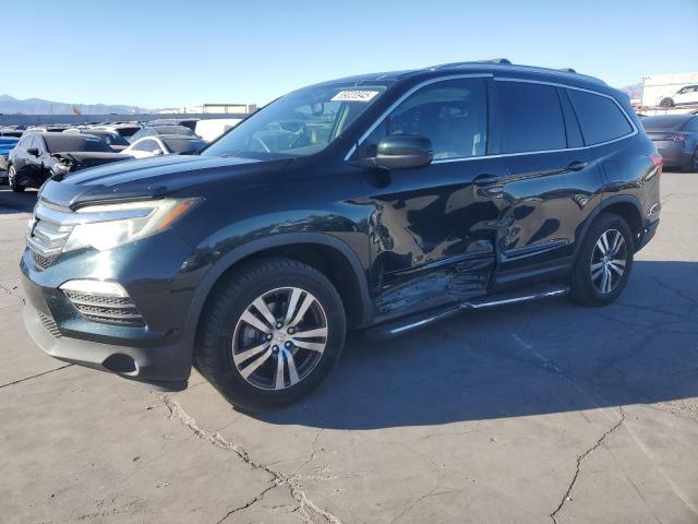 HONDA PILOT EXL 2016 with VIN 5FNYF6H85GB088621 - Photo from auction