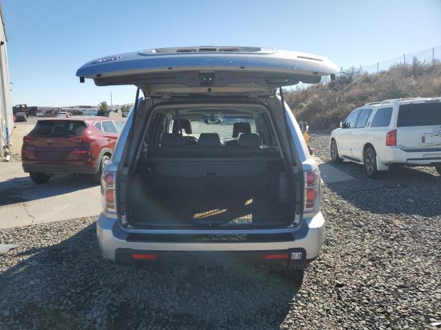 Photo 6 from auction – 2006 HONDA PILOT EX with VIN 2HKYF18566H530766