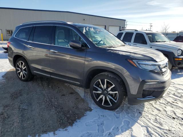 Photo 4 from auction – 2022 HONDA PILOT ELIT with VIN 5FNYF6H04NB044391